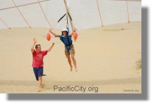 Hang Gliding in Pacific City - Instructor helping student