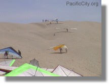 Hang Gliding in Pacific City walking up Cape Kiwanda